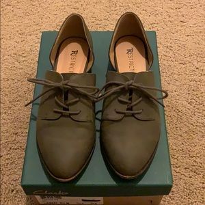 Restricted green lace up flats